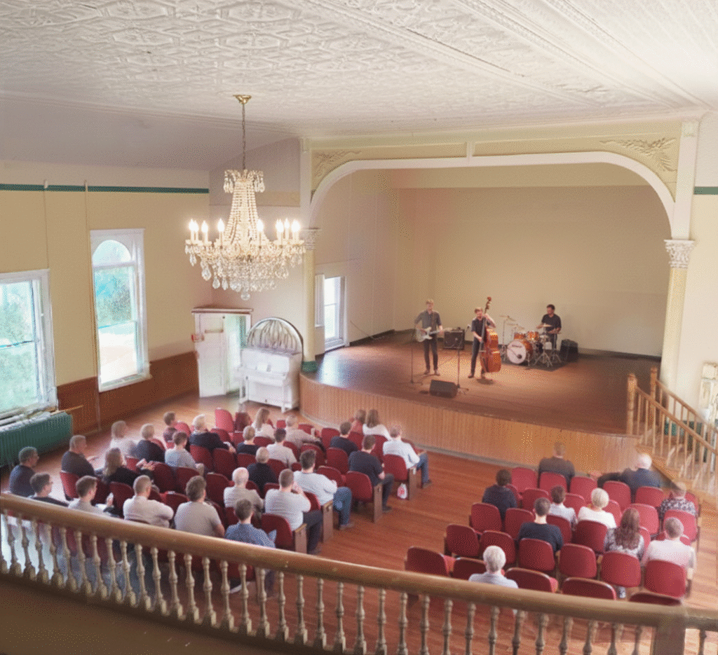 Artist's rendition of what the area could look like with work. A lovely, bright, entertainment area.
